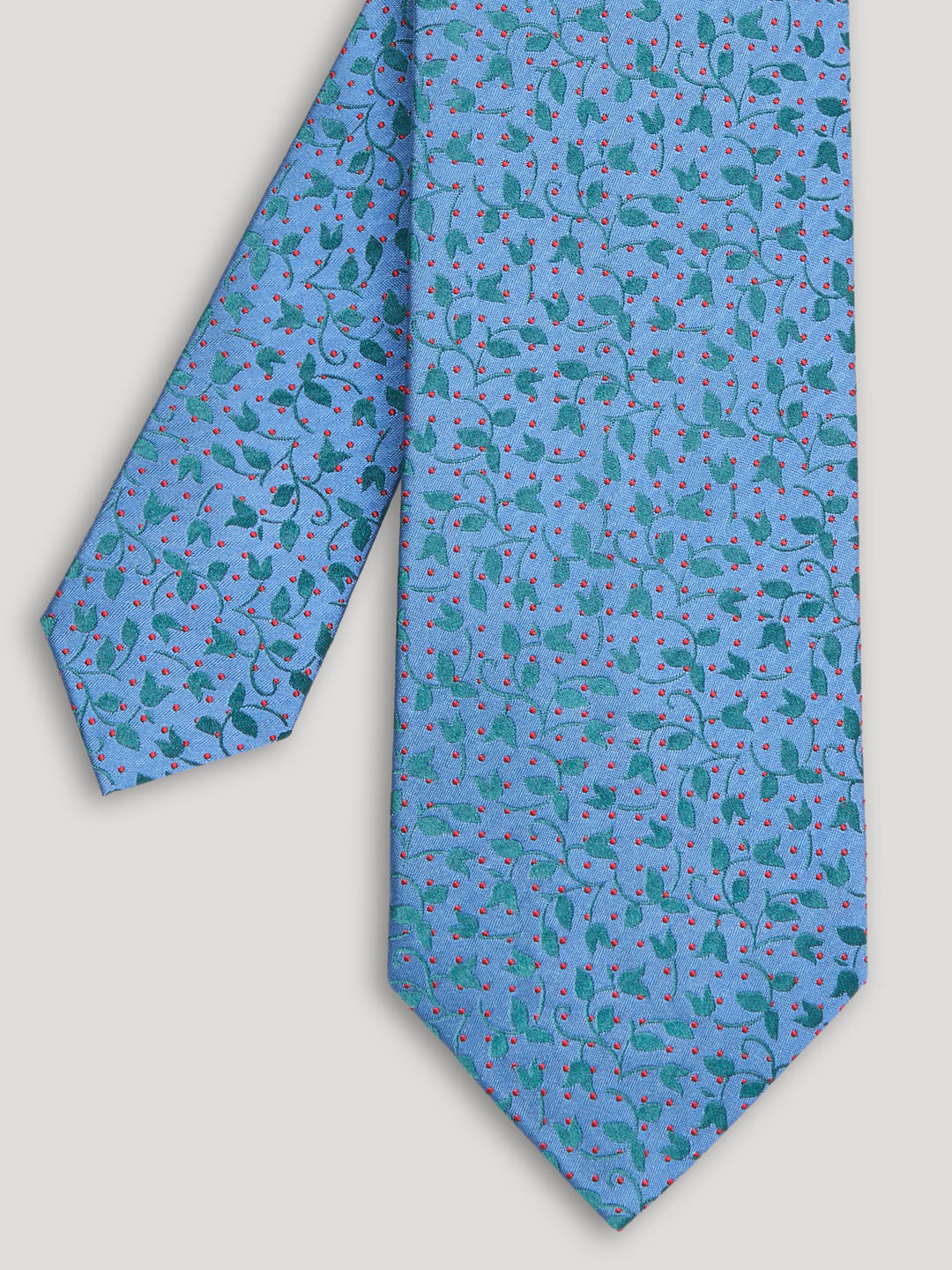 Sky blue tie with green and red floral details. 