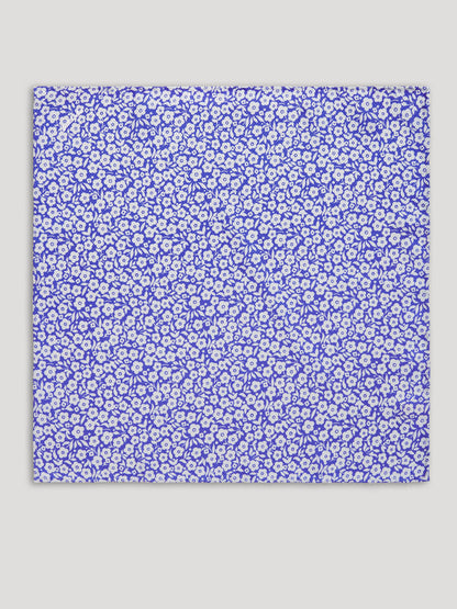 Violet blue handkerchief with silver ties. 