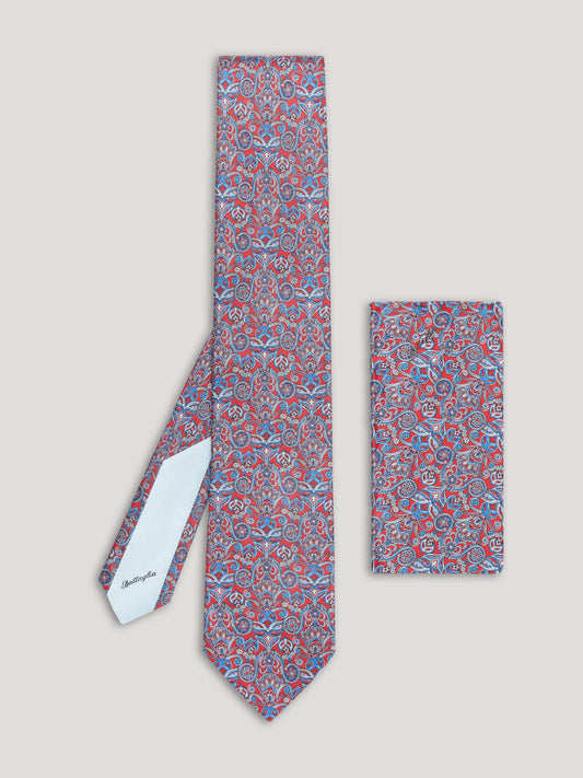 Blue and red floral design tie with matching handkerchief. 