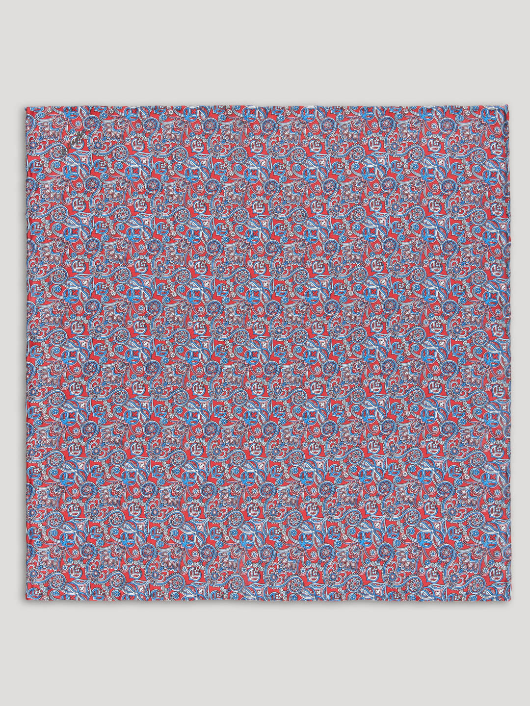 Handkerchief with red and blue floral design. 
