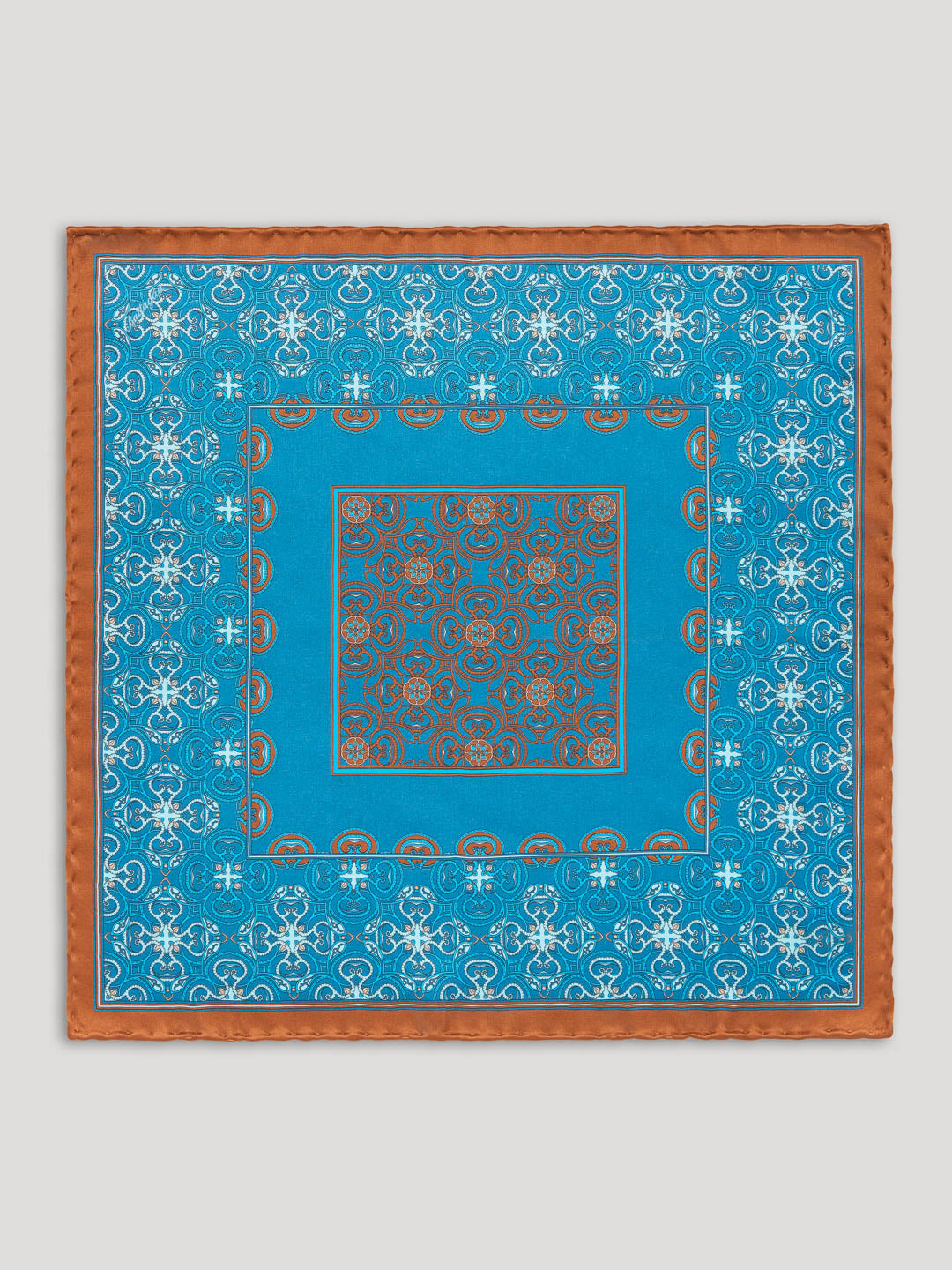 Turquoise and brown paisley handkerchief. 