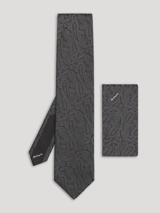 Black paisley silk tie with matching handkerchief. 