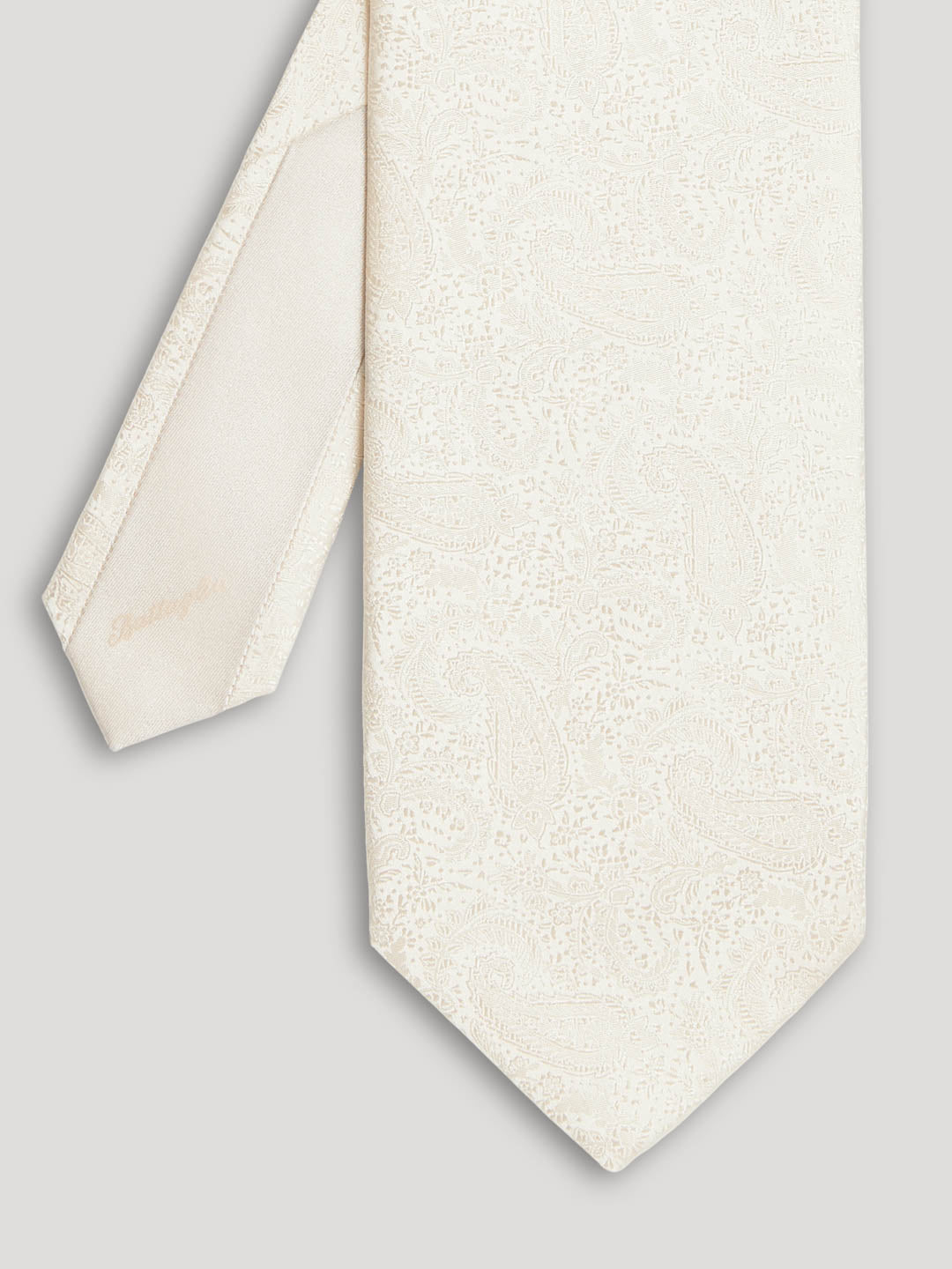 Cream white paisley silk tie. 